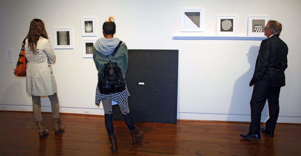 Visitors at the UA Faculty Biennial, Sarah Moody Gallery of Art