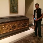 student standing next to a cassone