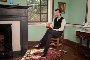 UA student Sam Hardy portrays a 19th century reader in an ART 428 photo shoot. ©2015 Art 428, Department of Art and Art History.