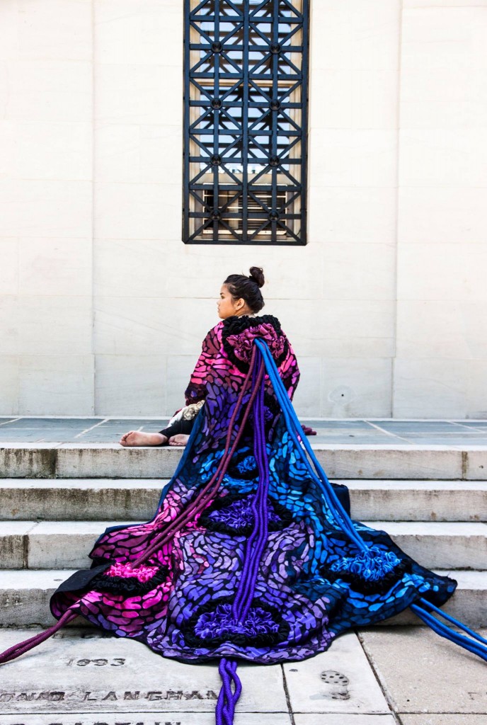 Schoolmate Jennifer Ocampo models a kimono by Ali Hval in April on UA's main quad.