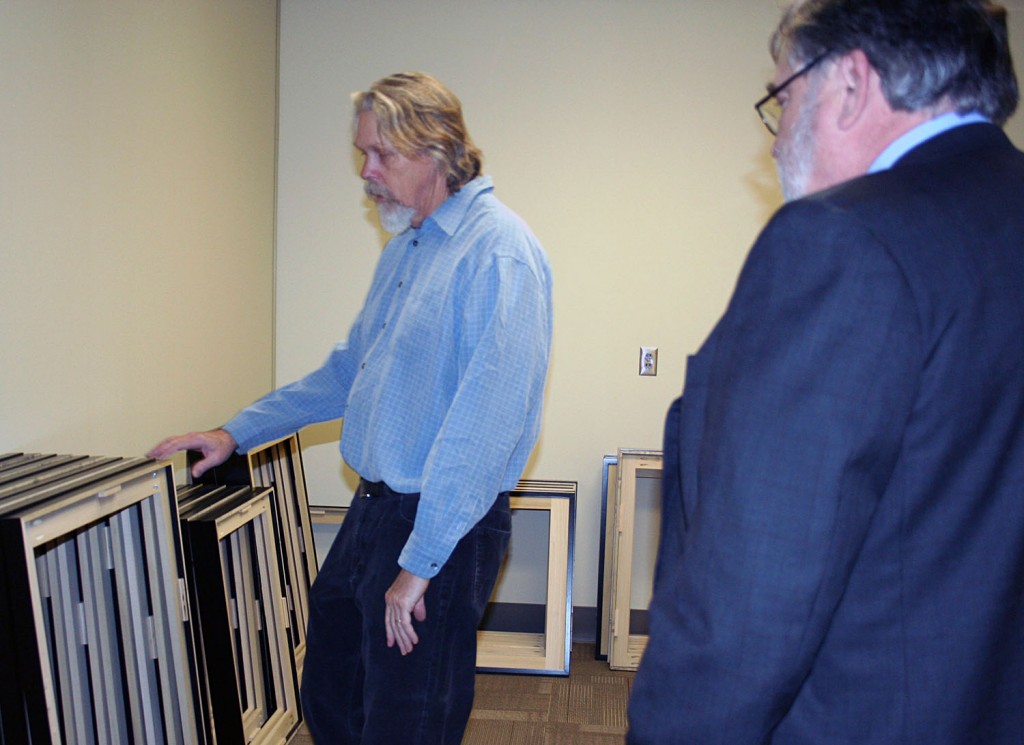 SMGA Director Bill Dooley gives Dean Olin a tour of the new space.