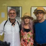 UA Honors College instructor Chip Cooper, Karen Graffeo and Cuban photographer and gallery owner Julio Larramendi