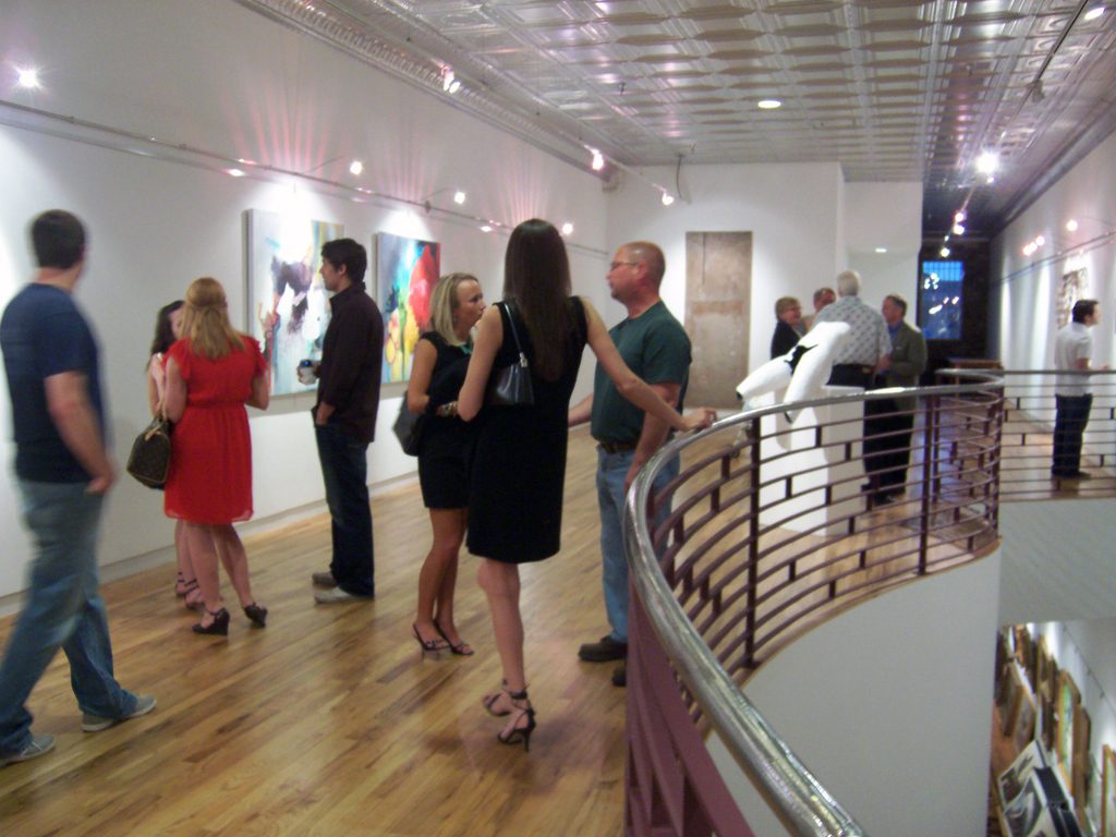 Harrison Galleries in downtown Tuscaloosa during a First Friday gathering.