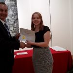 Rebecca Powell receiving a scholarship award