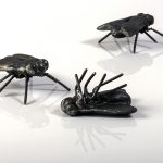 April Livingston, Three Flies, 2016, cast iron and steel, each fly is 3 inches x 4 feet 7 inches