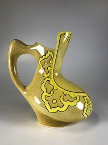 ceramic pitcher with shiny glaze
