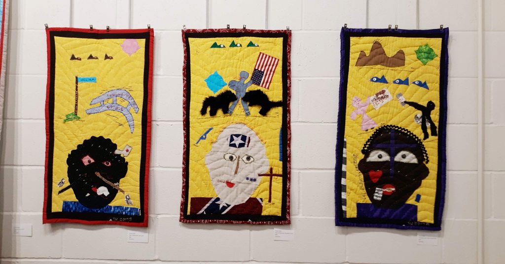 Yvonne Wells quilted hangings at The Arts Council Gallery, DWCAC