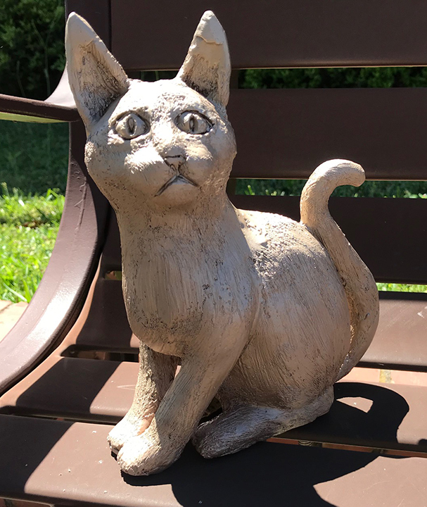 Alyson Smith’s bronze sculpture of a cat commemorates poet and journalist Riley Kelly in Monroeville's Literary Capital Sculpture Trail.