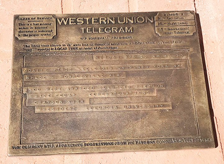 Jennifer Gault’s bronze sculpture of a telegram announcing Pulitzer Prize awards honors winners Harper Lee, Cynthia Tucker and Hank Williams Sr., in Monroeville's Literary Capital Sculpture Trail.