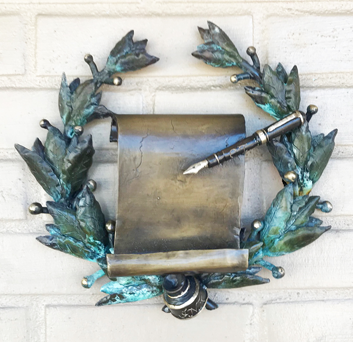 Ringo Lisko’s bronze sculpture of a pen and scroll in a laurel wreath honors Pulitzer Prize-winning journalist Cynthia Tucker in Monroeville's Literary Capital Sculpture Trail.