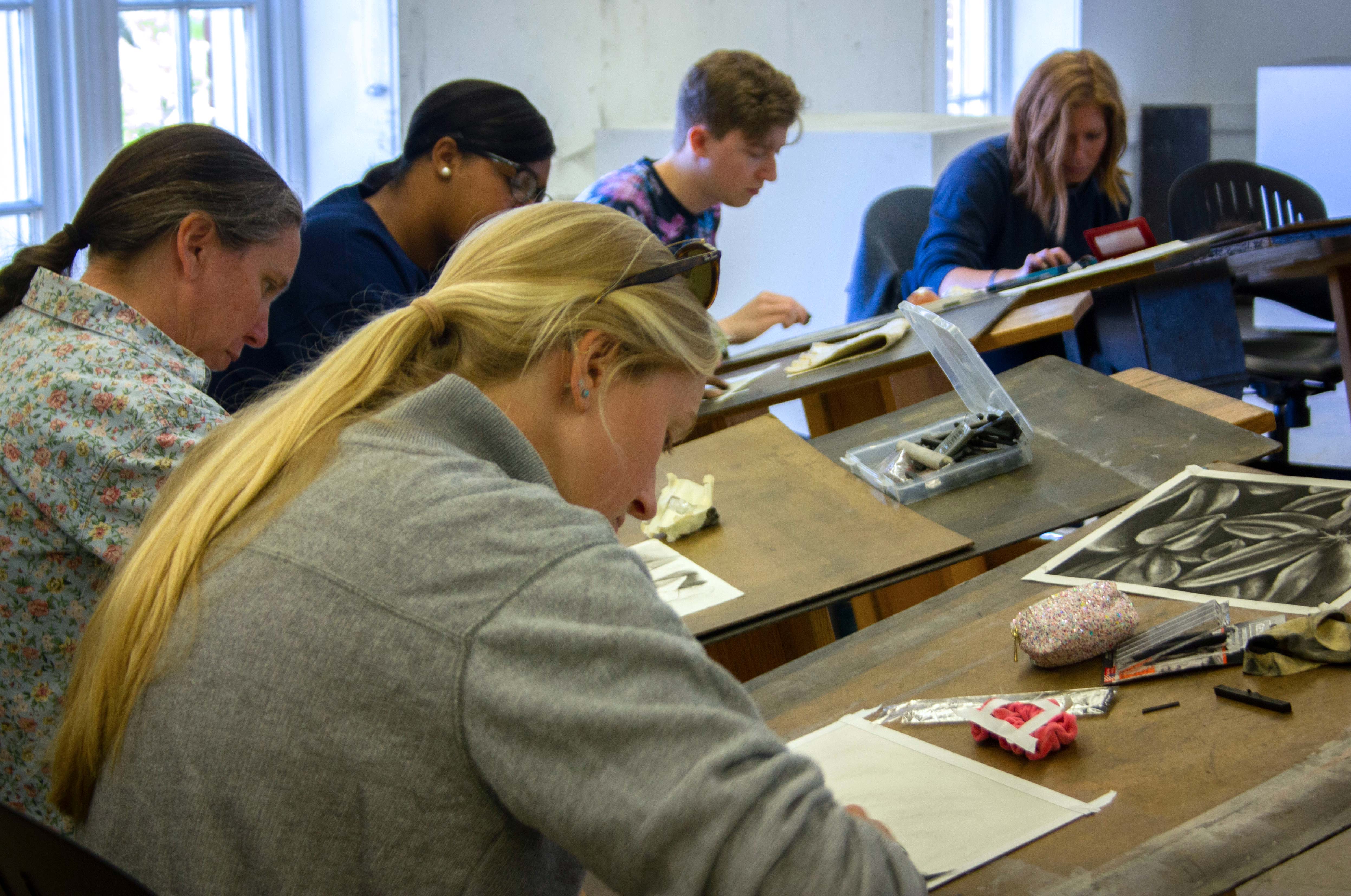students in a drawing class